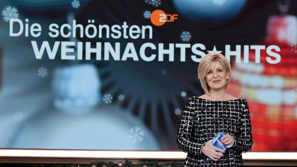Mit einem Angebot an das Publikum eröffnete Moderatorin Carmen Nebel in diesem Jahr die ZDF- Spendengala "Die schönsten Weihnachts-hits": "Ich mache Ihnen heute Abend ein faires Angebot: Wir schenken Ihnen wunderschöne Musik und Sie helfen uns heute ein großes Jubiläums-Spendenergebnis zu erzielen“. © Sascha Baumann